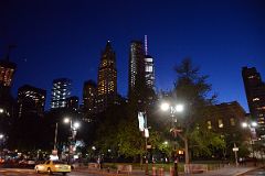 11-1 Woolworth Building, 30 Park Place And One World Trade Centre Above New York City Hall Park At Night In New York Financial District